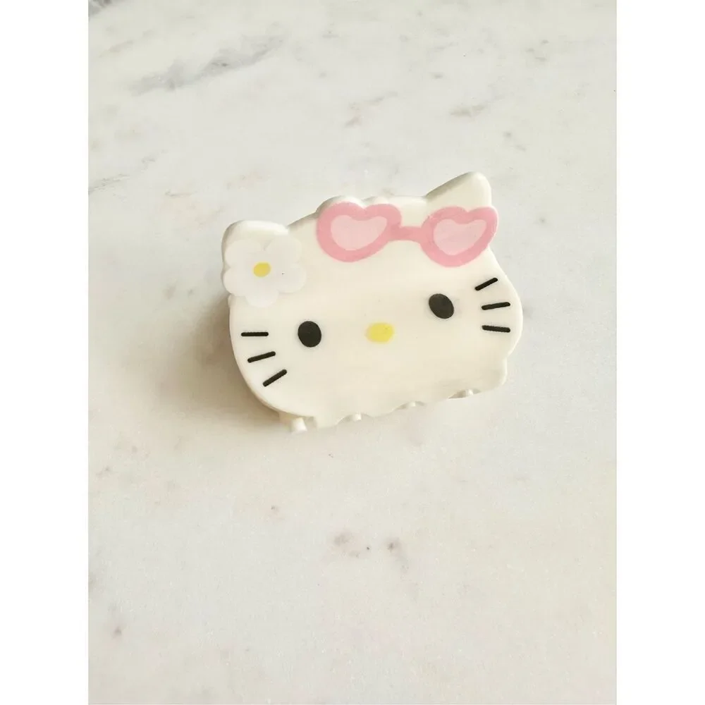Cute hello Kitty with pink sunglasses hair claw ￼